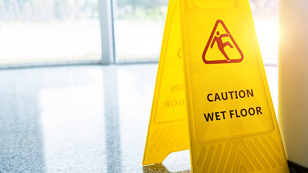 Caution wet floor sign on the floor